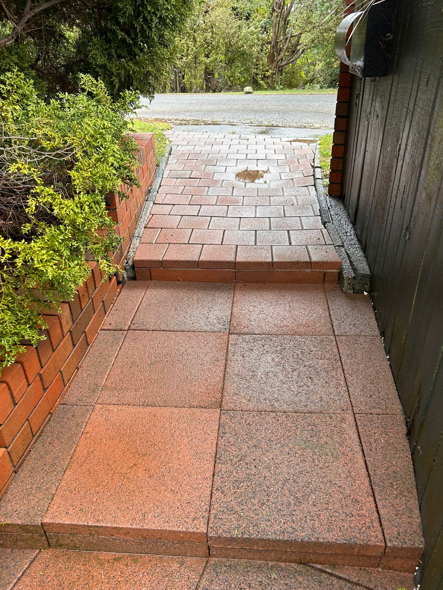 Clean brick pathway after pressure washing