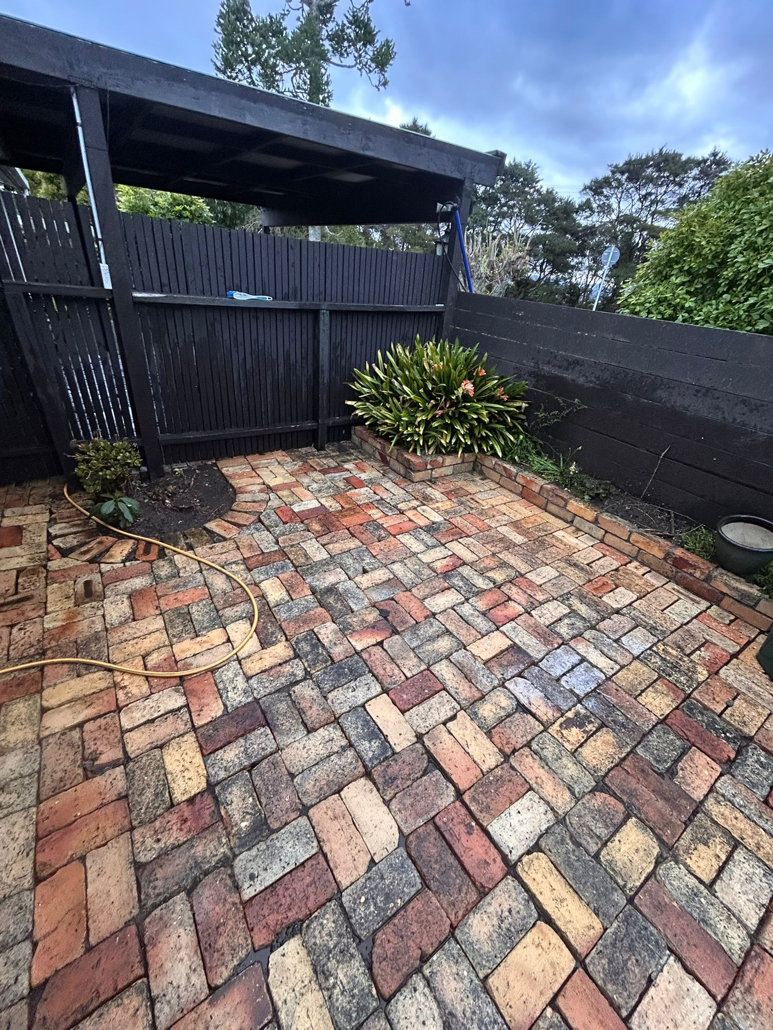 Clean patio after pressure washing