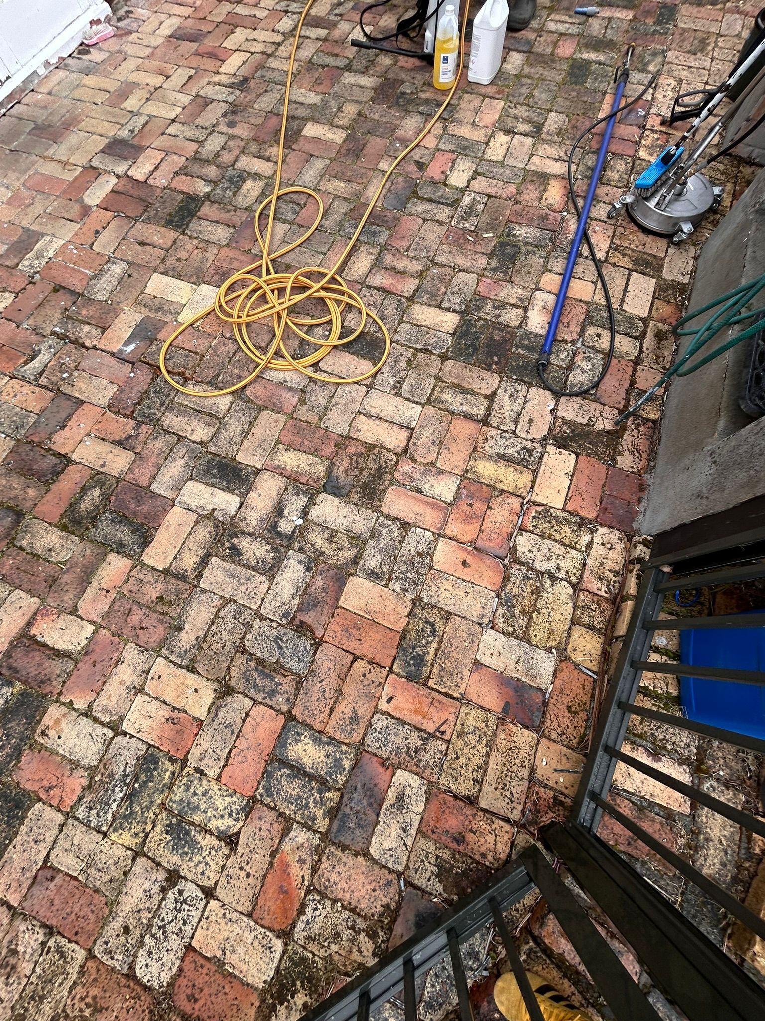 Brick patio before cleaning