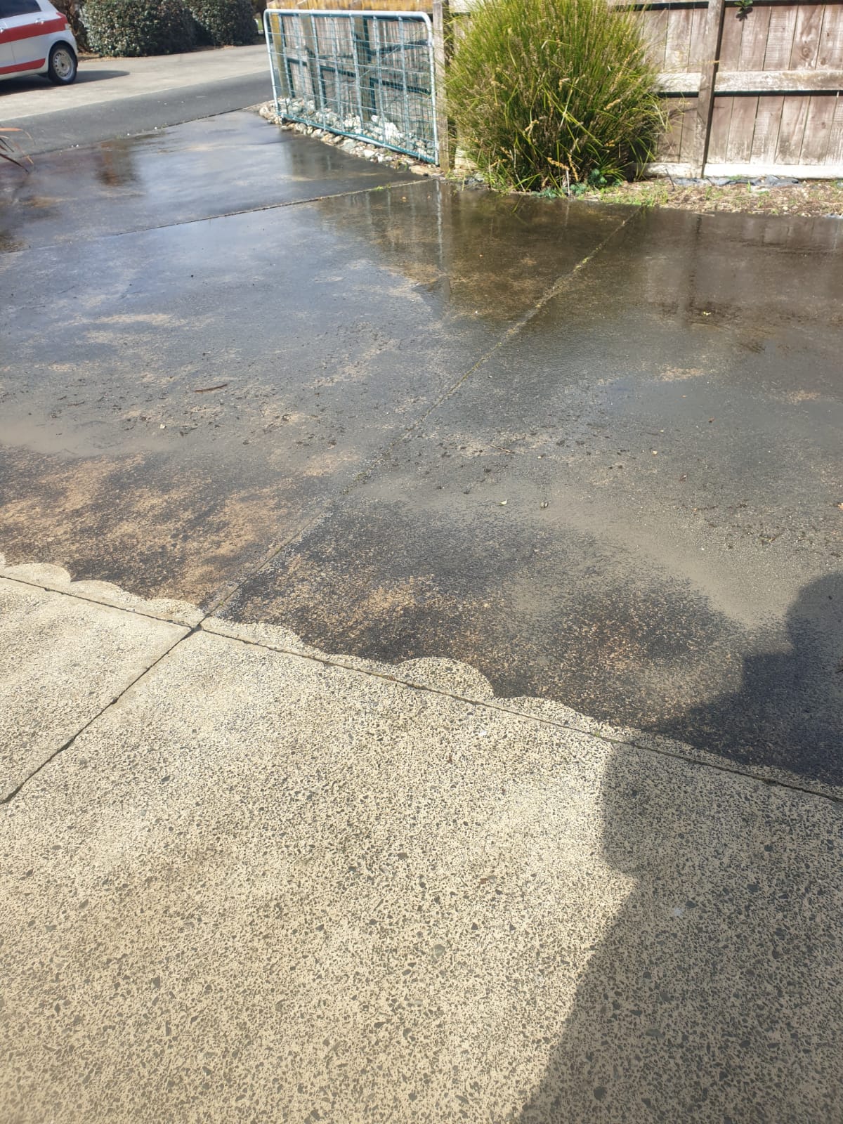 Driveway being pressure washed